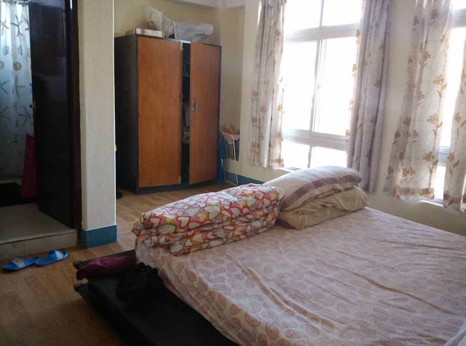 Kingsized bedroom with attached bathroom