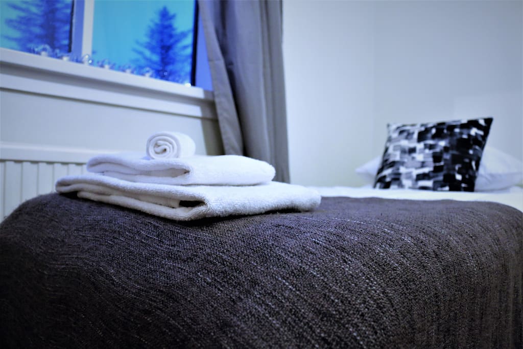 Bed linen and towels are provided.