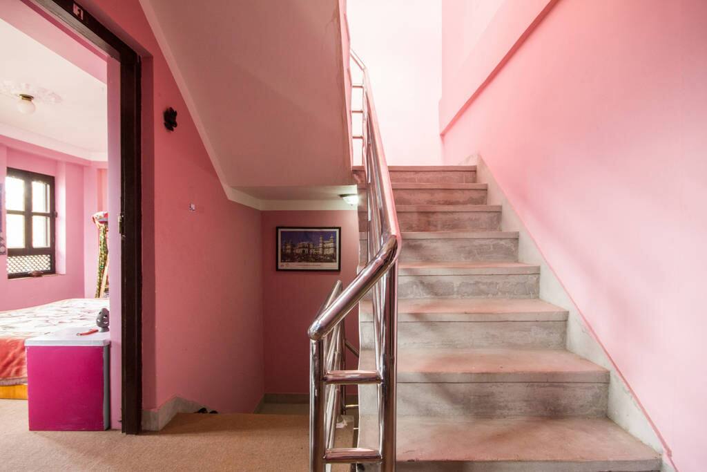 Stairs leading to the rooms