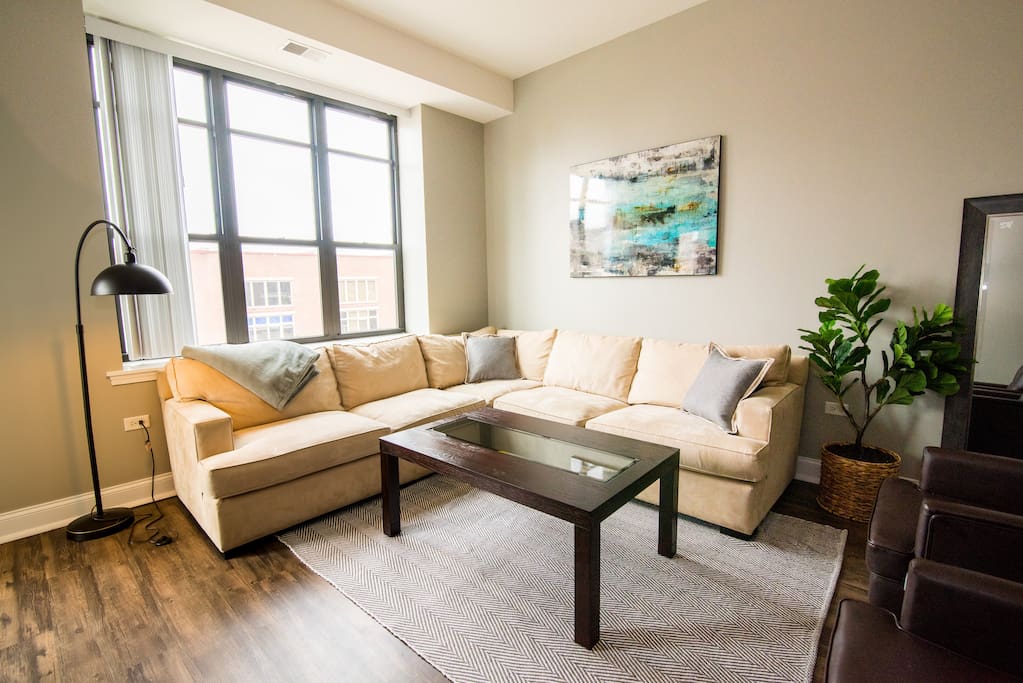 Enjoy our sun-lit living room with complimentary Netflix and DirecTV Now!