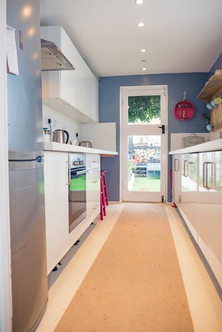 Well equiped kitchen leading onto private garden