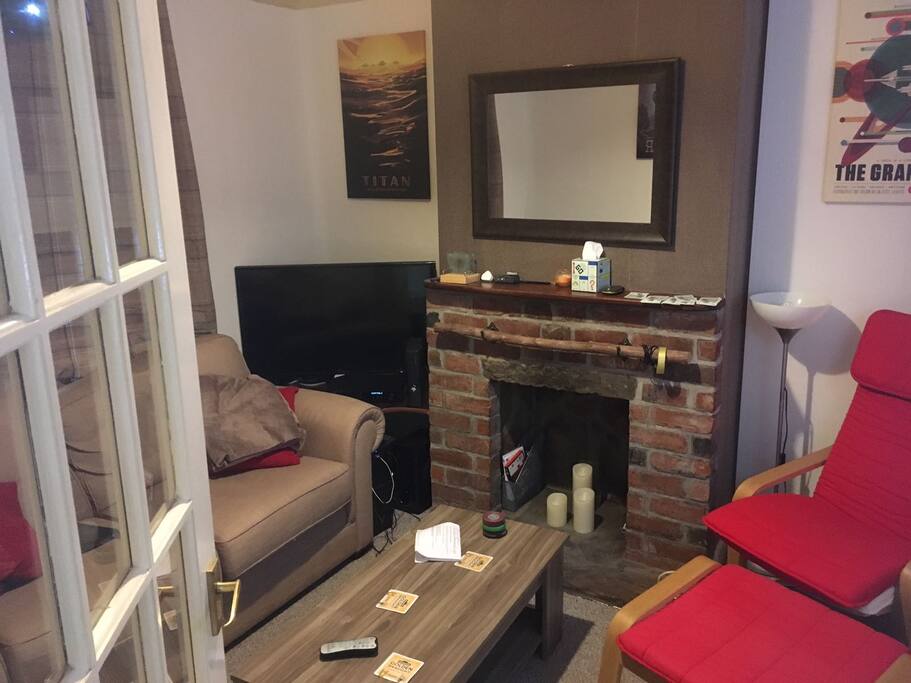 Lounge, complete with projector, laptop and Xbox use. Couch suitable for sleeping and air mattress available on request.