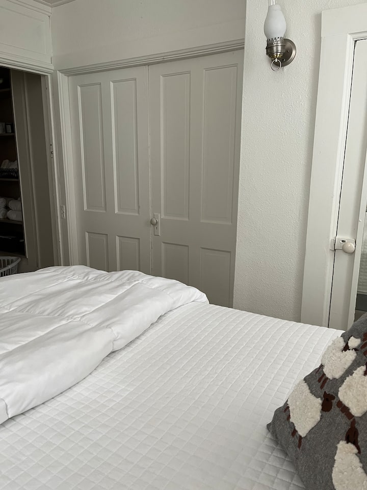 Queen bedroom can be closed off from twin bedroom