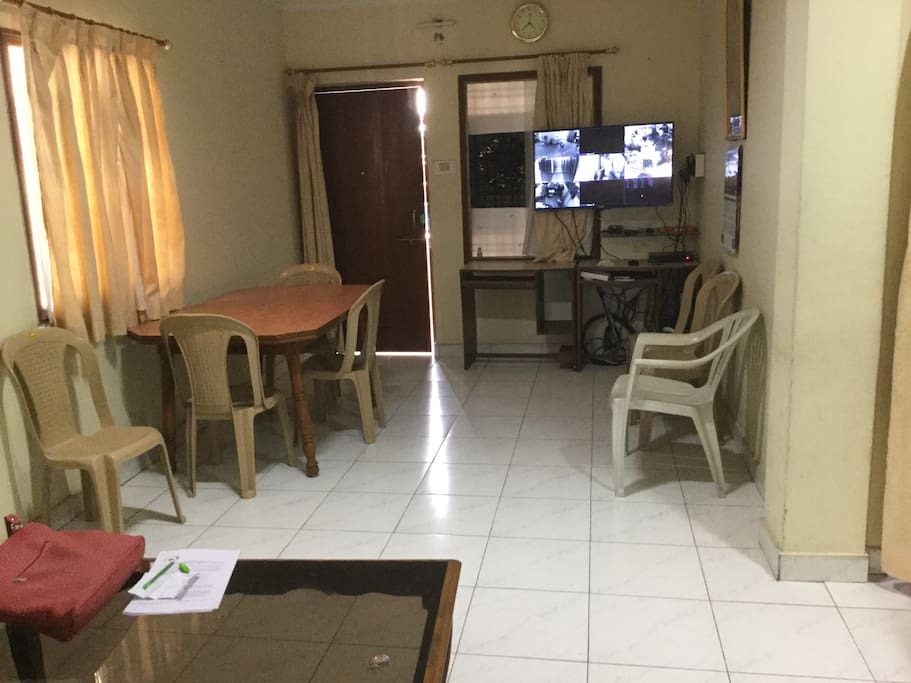 Big lounge with TV , TABLE , COFEE TABLE , BIG FIDGE.