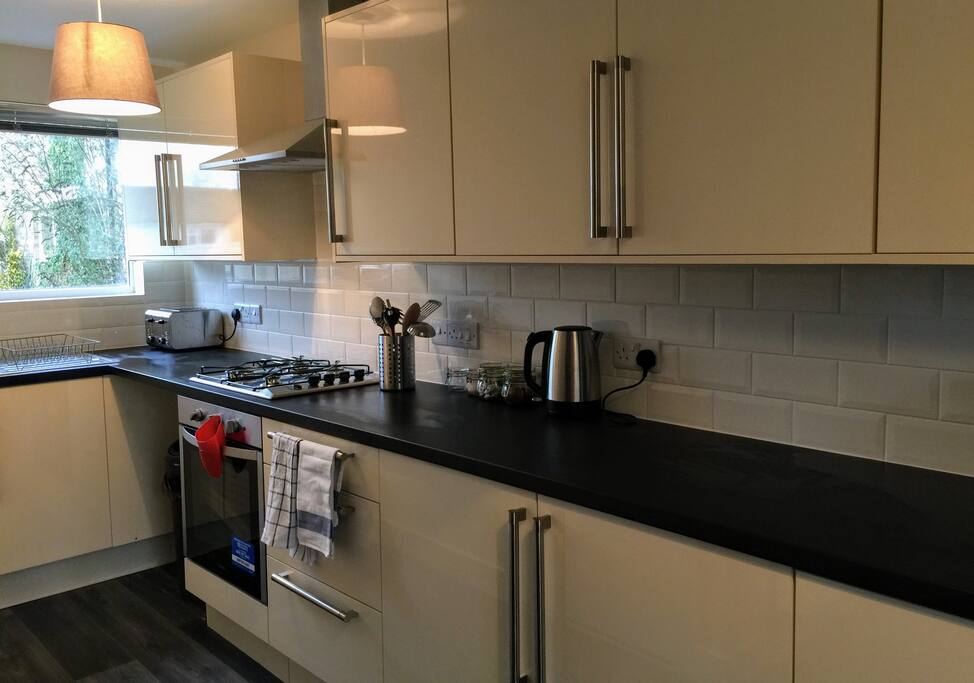 A clean and modern kitchen where you can prepare your meals at a time that suits you. Home from home.