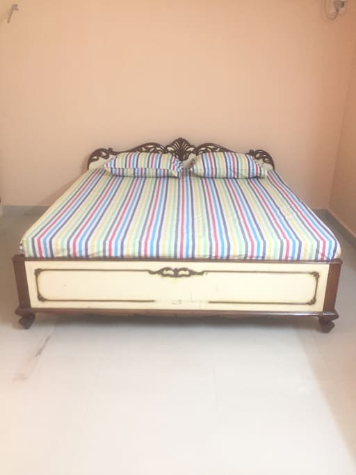 King Size Wooden Cot with Mattresses for a comfortable sleep