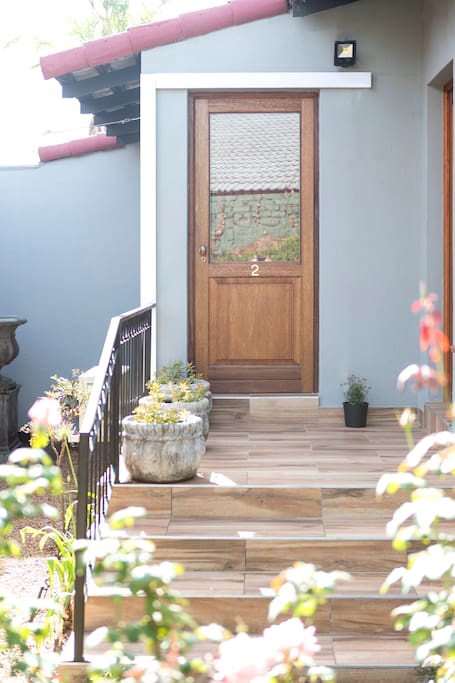 Private entrance away from host's view.