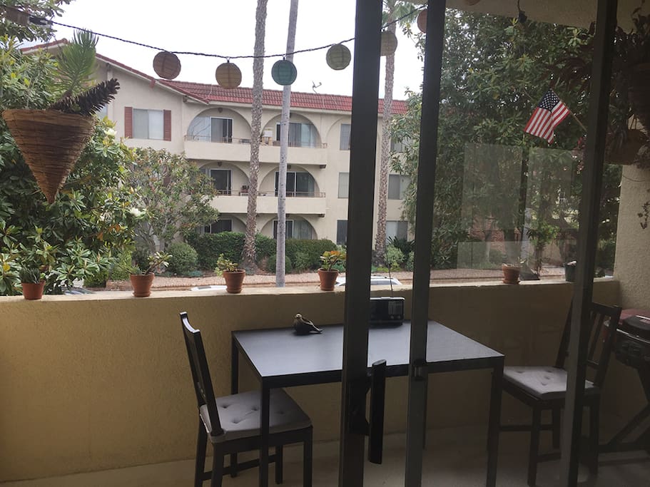 Balcony with view of neighborhood. Gas grill you can use.