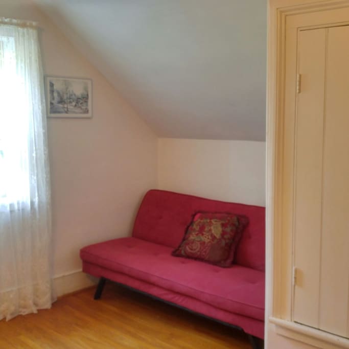 Sitting area in the guest bedroom. Futon sleeps one adult comfortably.