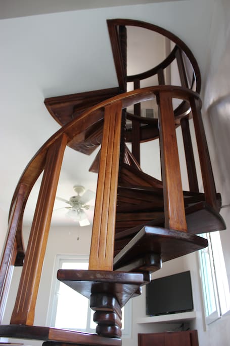 Beautiful wooden staircase to the upper level