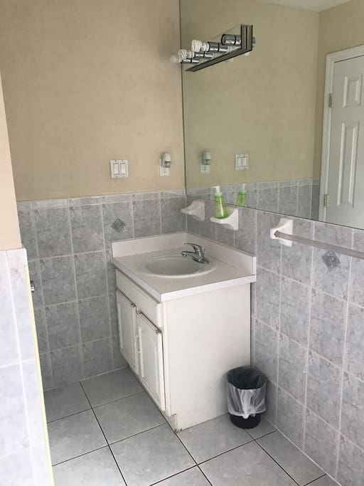 Bathroom is located right outside the guest bedroom.