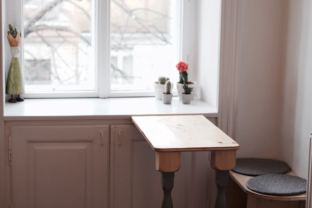 hand-crafted table and chair in the kitchen for breakfast