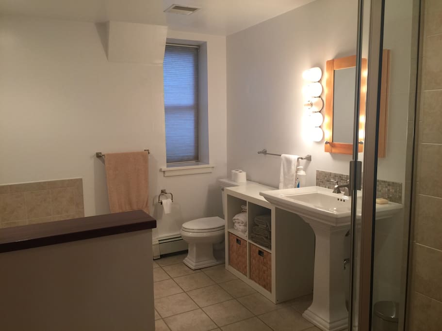 Private ensuite bathroom with separate shower and jacuzzi bath.