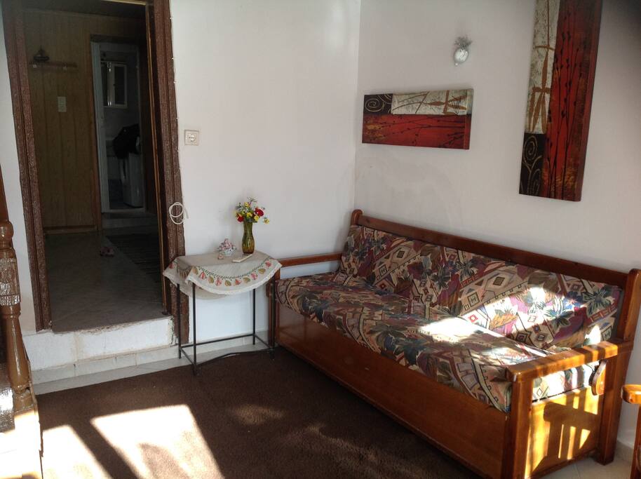 Cosy Front room leading to sun terrace and kitchen and bathroom