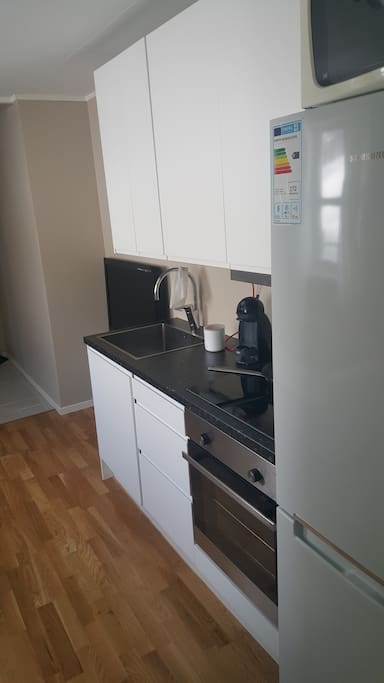 Smart kitchen with Dolce Gusto coffee machine.