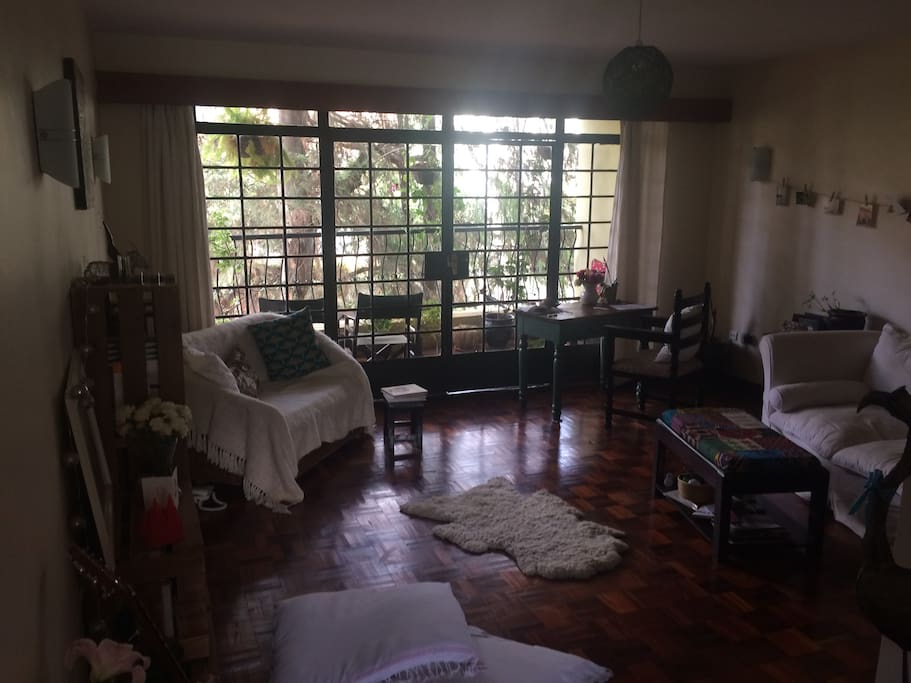 Large, sunny sitting room with balcony for morning coffees, reading, lounging...