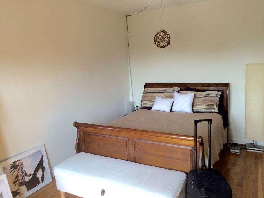 Queen seized bed. The other mattress is an inflatable mattress.