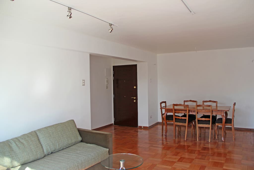 Vitrified parquet wood floor adds a nice touch to the apartment.