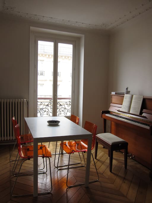 Dining room, upright Pleyel piano.