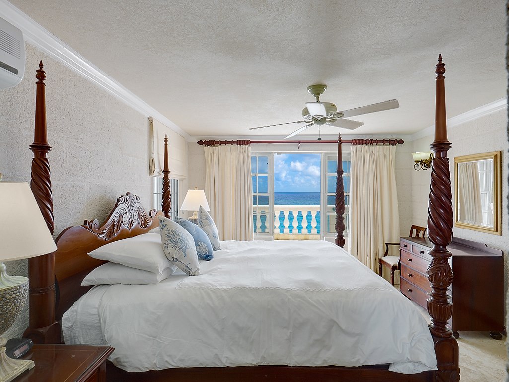 2nd floor bedroom with Air Conditioning, en-suite bath and walk out to private terrace and rooftop deck 