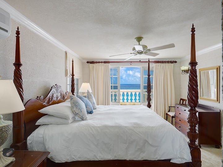 2nd floor bedroom with Air Conditioning, en-suite bath and walk out to private terrace and rooftop deck 