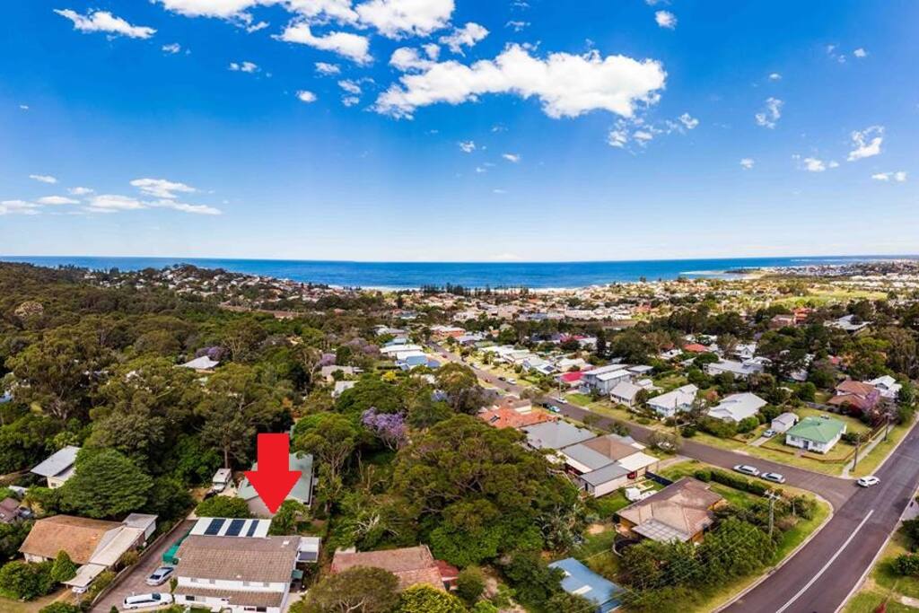 Aerial shot of the property highlighted by red arrow. Approximately 1 km back from the Pacific Ocean with breathtaking views.