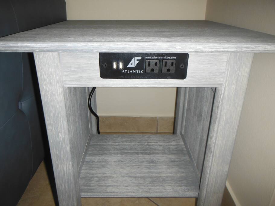 End Tables have built in USB and electrical sockets for easy access to charge phones, laptops, etc.