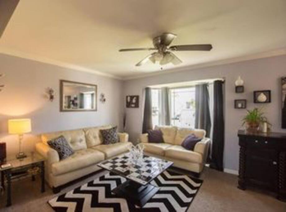 This is the living room , there also is a full size piano