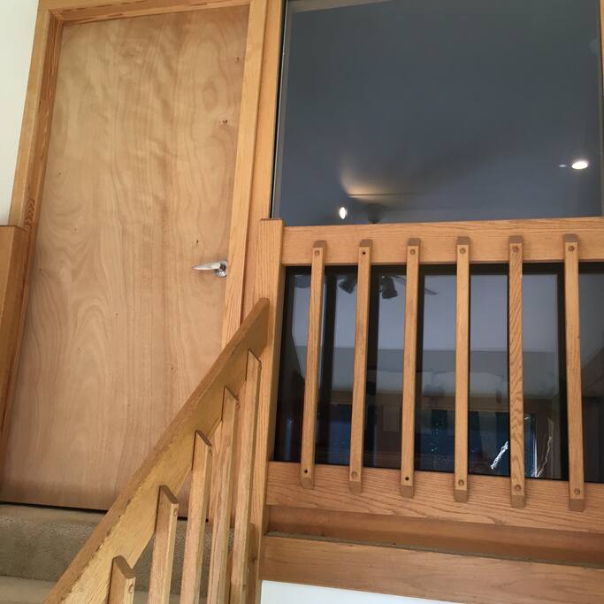 The door and window at the top of the stairs makes your entire floor all yours....privacy!
Good booking for two couples....your own bedroom and attached bath along with a tv room between the bedrooms