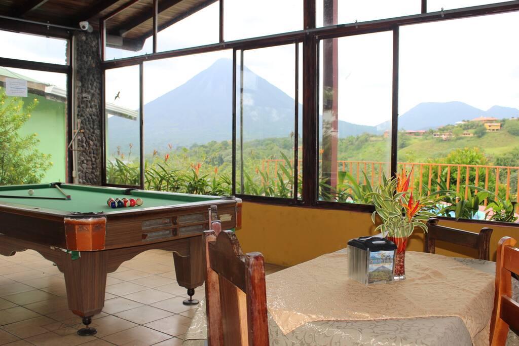 Seating area, pool table.