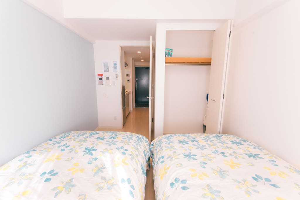 A bedroom with a closet