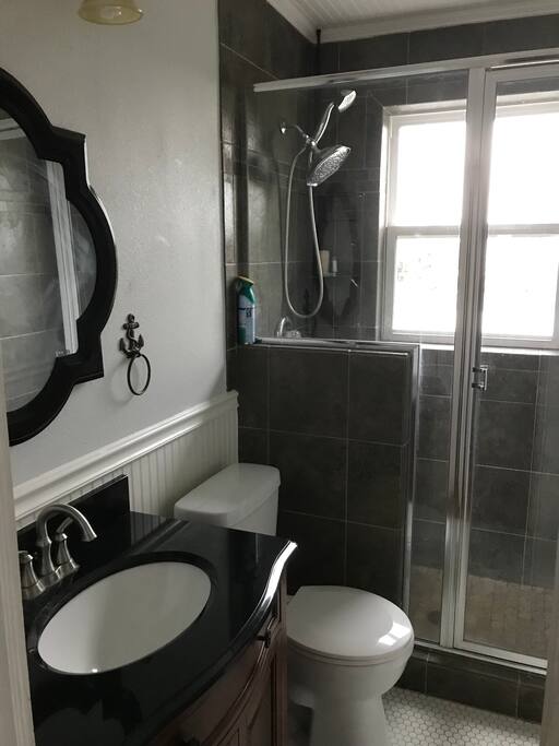 Upstairs bath with walk in shower.