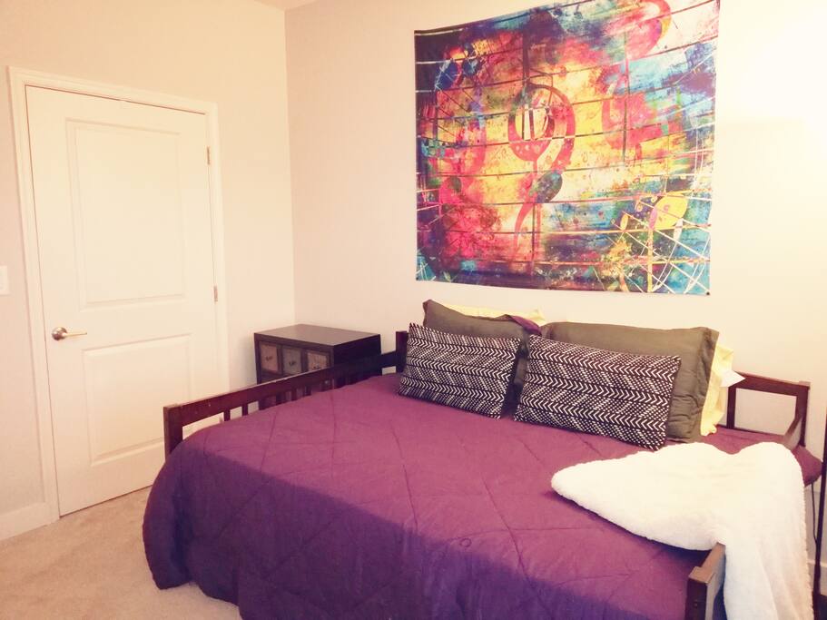 day bed with view of walk in closet