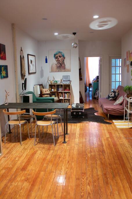 Huge common space with kitchen, dining area, living room and instruments at your disposal