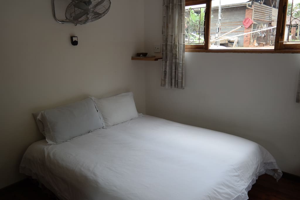 2 Single beds or 1 Queen - size bed in a non self-catering room with En-Suite bathroom