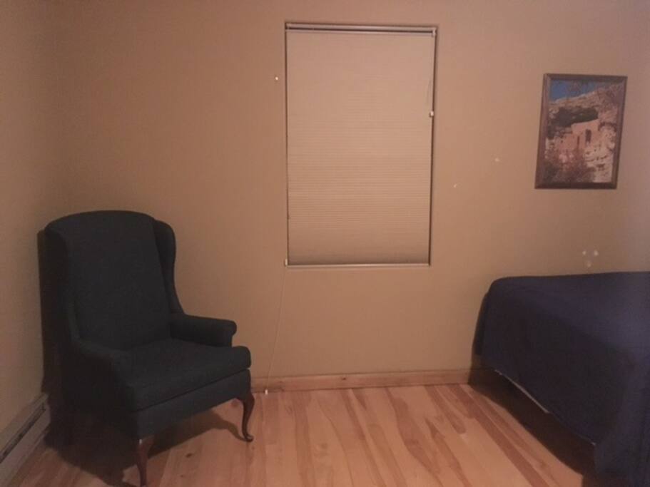 Guest room, chair, one of two windows