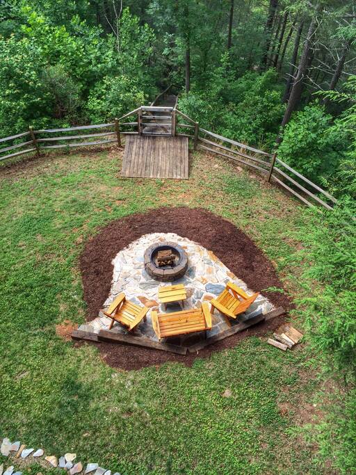 Fenced backyard with firepit...