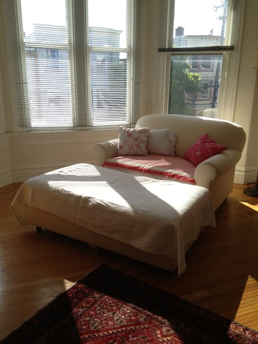 Your room: Large chair and a half provides comfy lounging space.