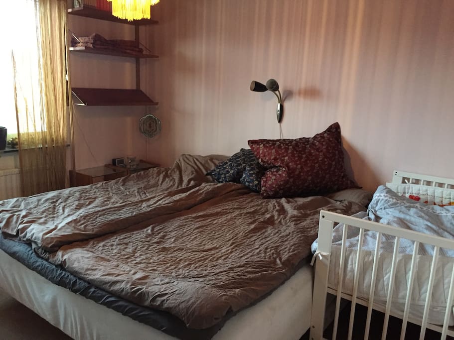 Master bedroom with 180x200 size bed and babycrib.