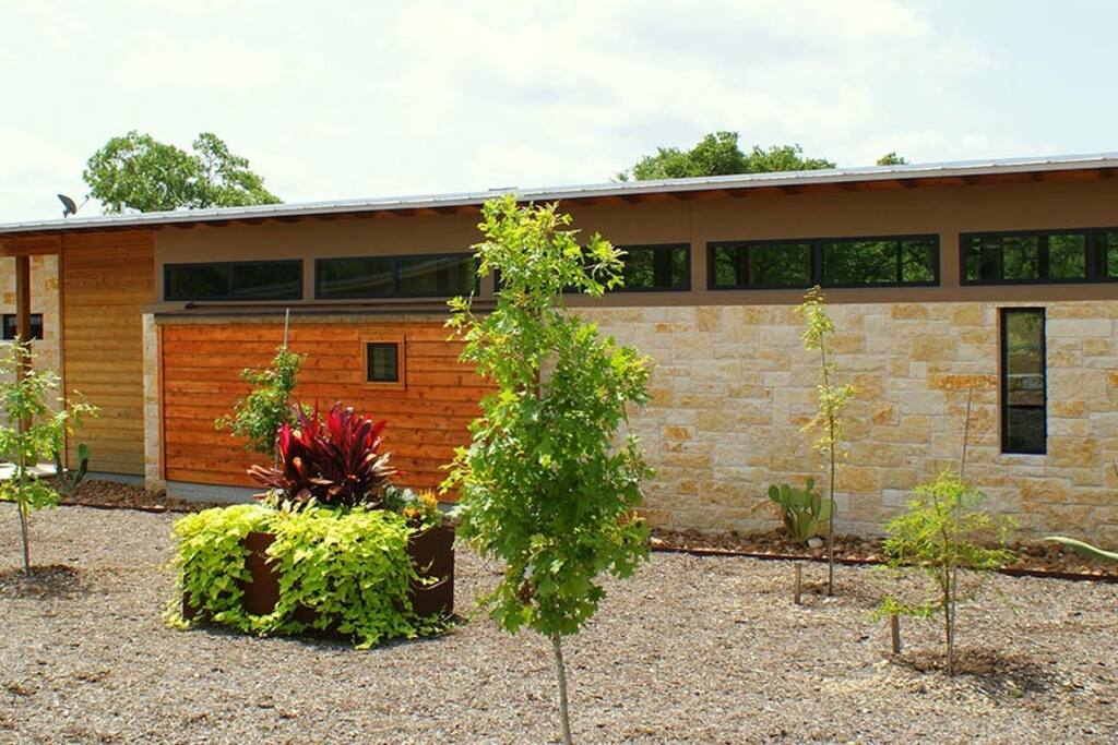 Tastefully landscaped entry.