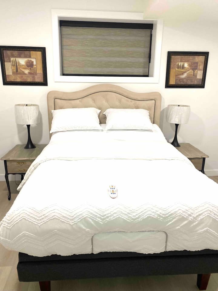 Master bedroom featuring tempur-pedic bed with remote for massaging and repositioning! 