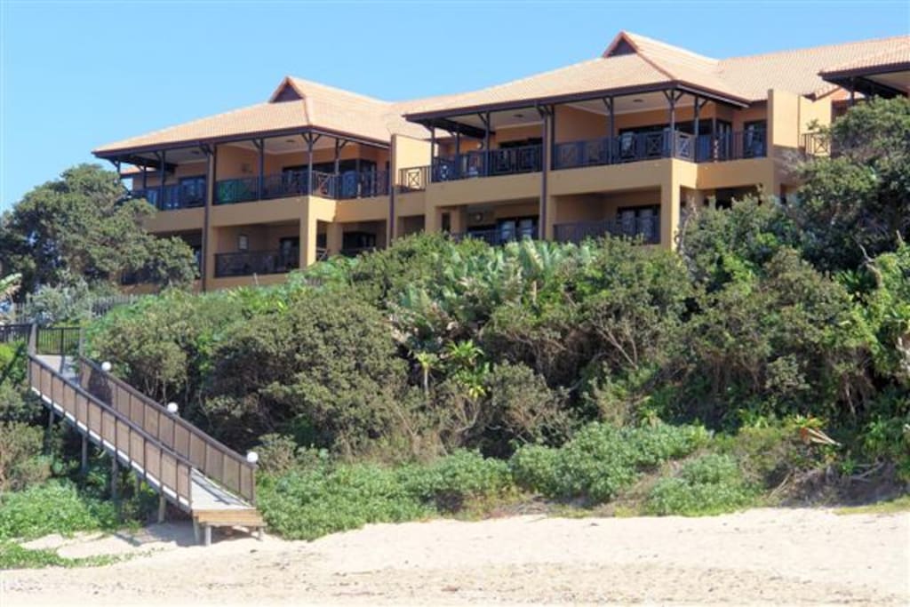 View of complex from the beach - direct beach access with no roads or railway lines to cross to get to the beach