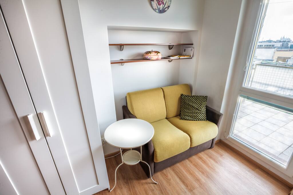 Living room: with 1 king-size bed for two person, foldout sofa for two person and tiny dinning area.