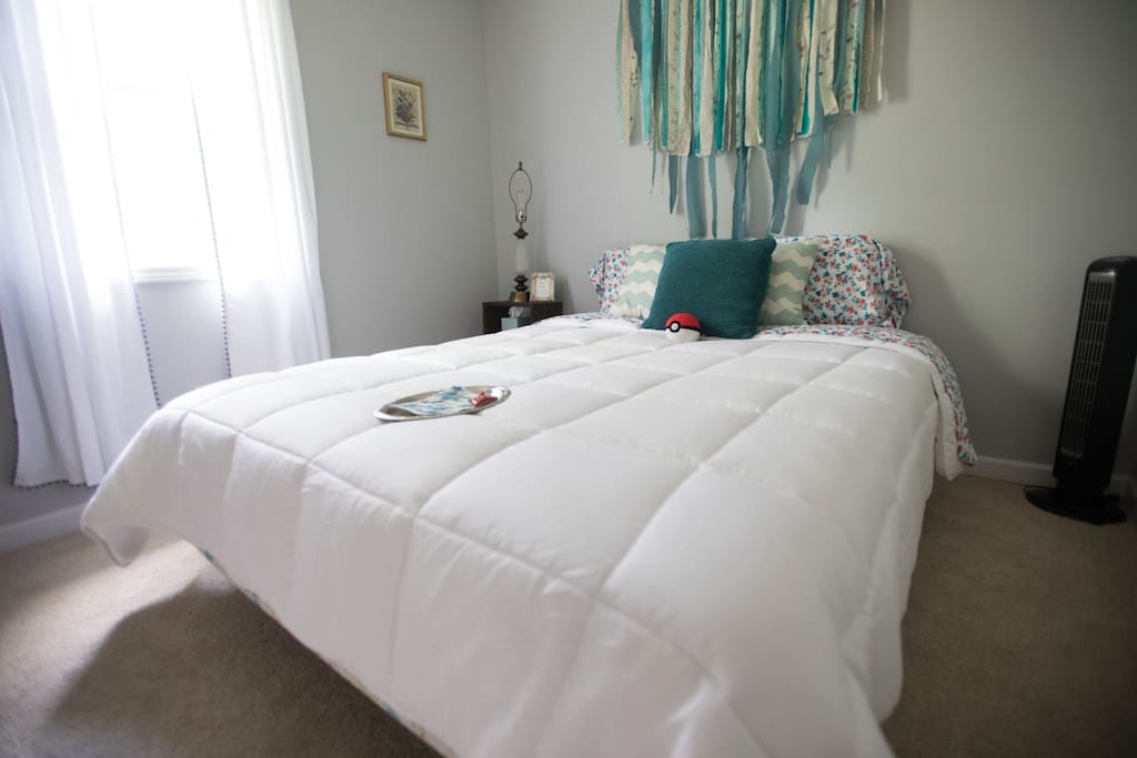 Queen-Size Bed and comfortable, fresh sheets.