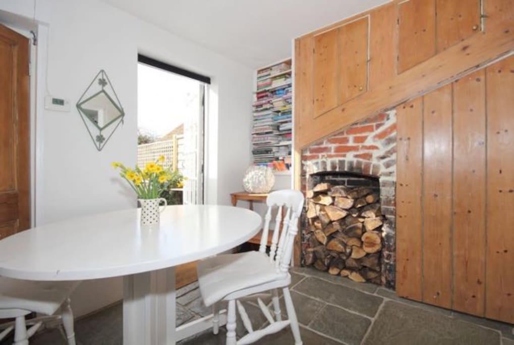 Dining area with flagstone floor and original features
