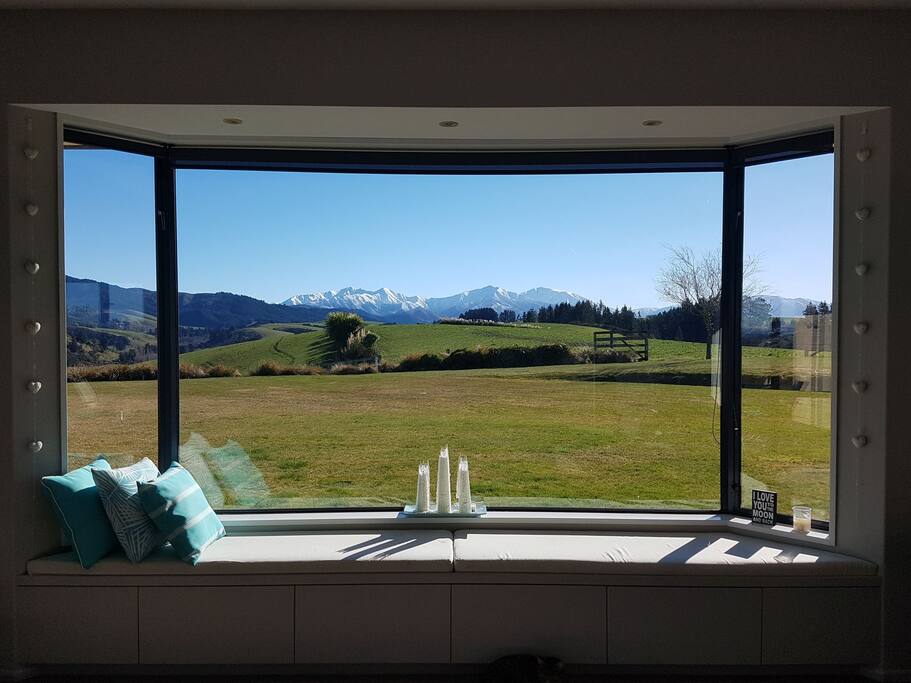 View from lounge and kitchen across our front lawn and farm