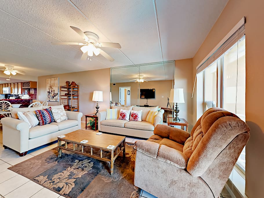 Plenty of comfortable seating can be found in the main living area.