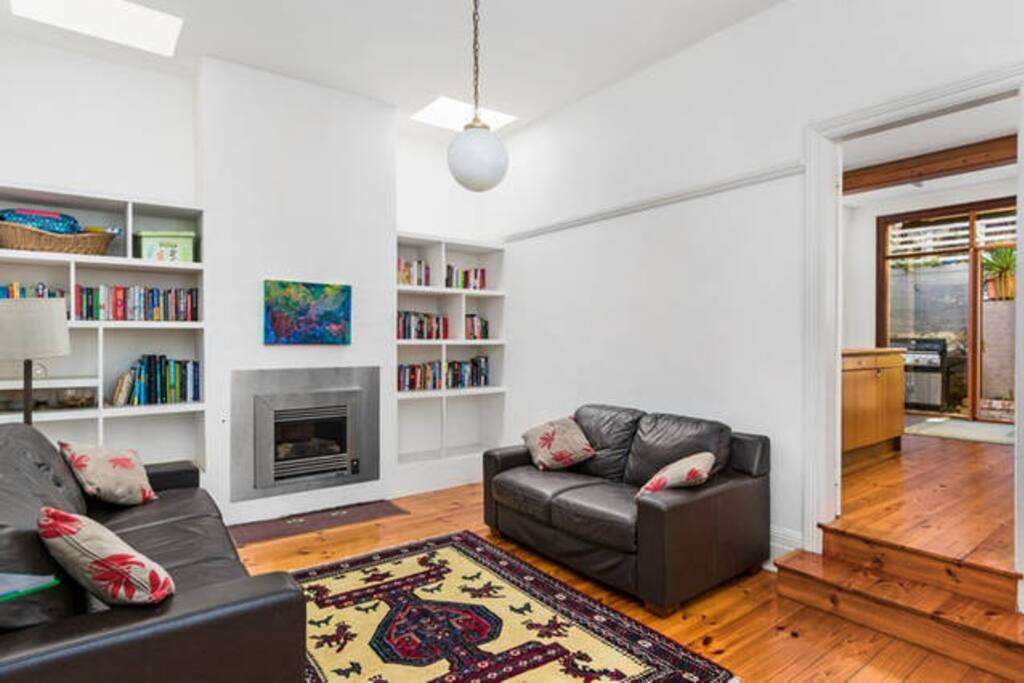 Comfortable lounge including big screen TV and gas fireplace