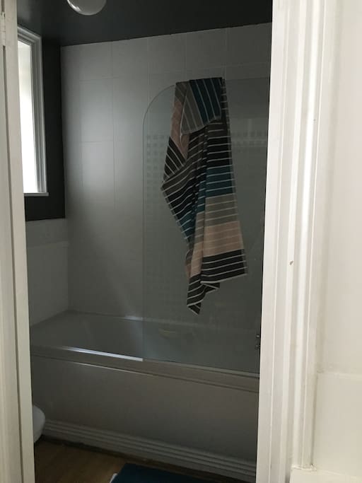 Bath with overhead shower