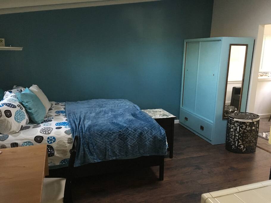 This is the bedroom with a closet. All rooms have windows and there is also a skylight.